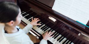 Student Playing the Piano